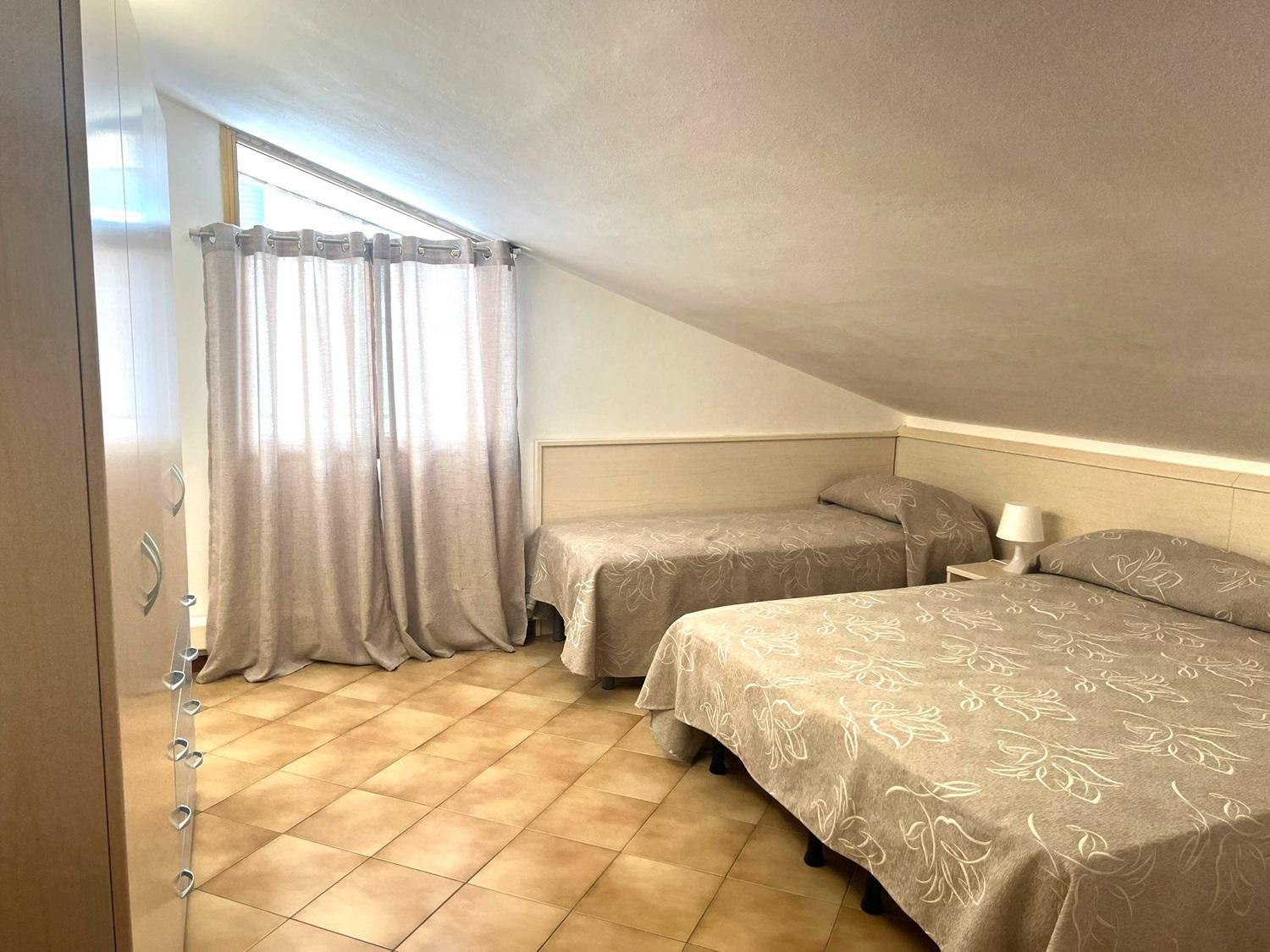 Adria Family Apartments: Beachside Comfort In Apartment