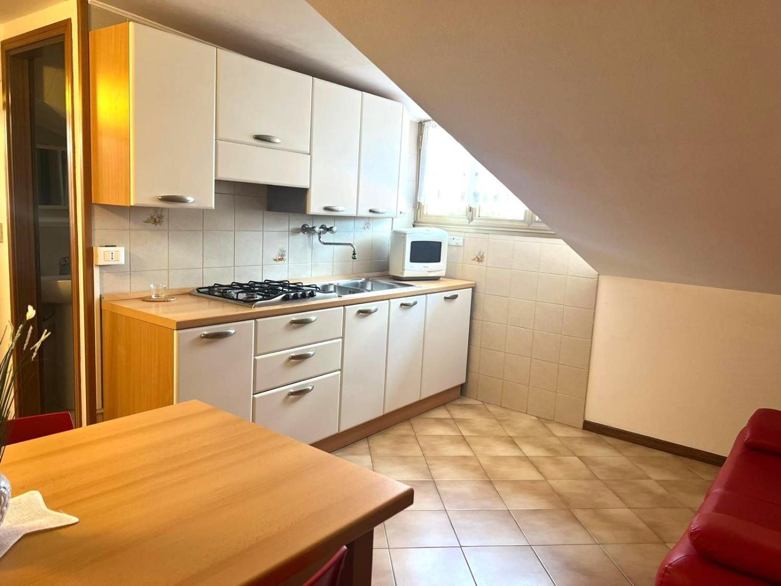 Adria Family Apartments: Beachside Comfort In *